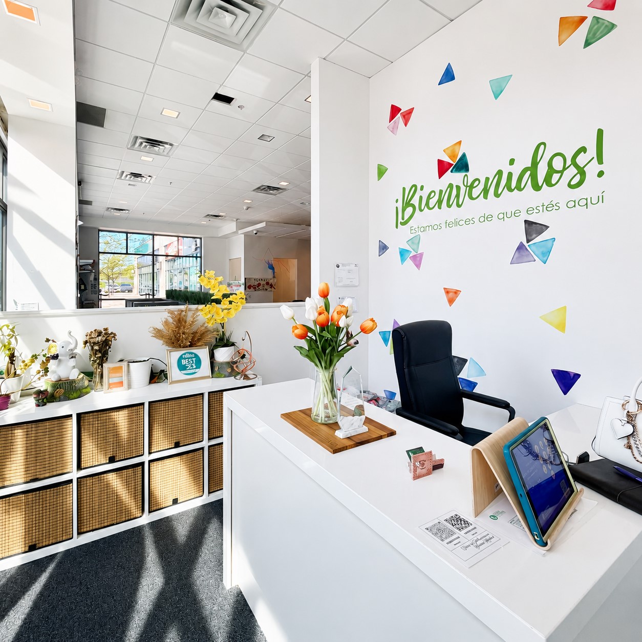 The welcoming entrance at Edina Daycare features Spanish immersion elements, natural materials, and a bright, family-friendly environment that reflects the school's commitment to belonging, community, and early childhood learning.